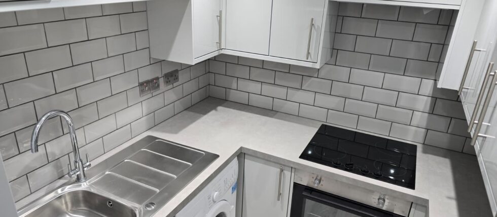 New kitchen at 20 Dollis Drive - Rent student accomodation in Farnham or student houses, halls, property for UCA Students. Slide 1